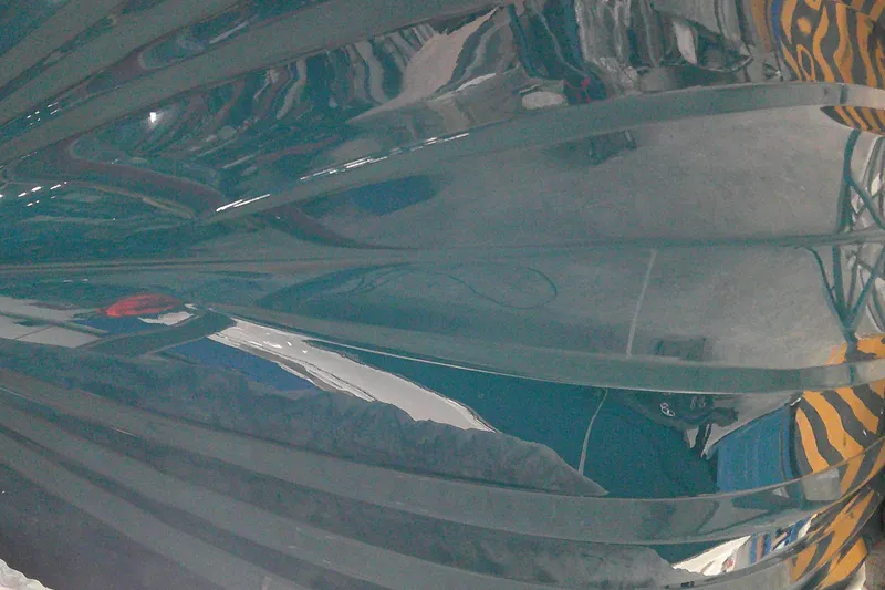 Slide: The Image of Shiny blue surface of 2025 Tahoe 185 S boat reflecting surroundings. - 4