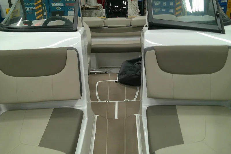 Slide: The Image of Interior view of 2025 Tahoe 185 S boat with beige seating and modern design. - 6