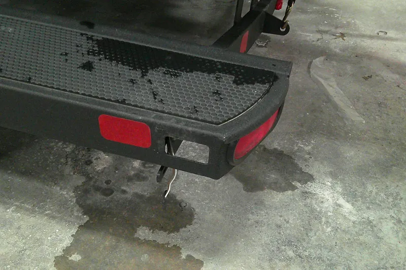 Slide: The Image of Rear view of 2025 Tahoe 185 S trailer hitch with red reflectors. - 8