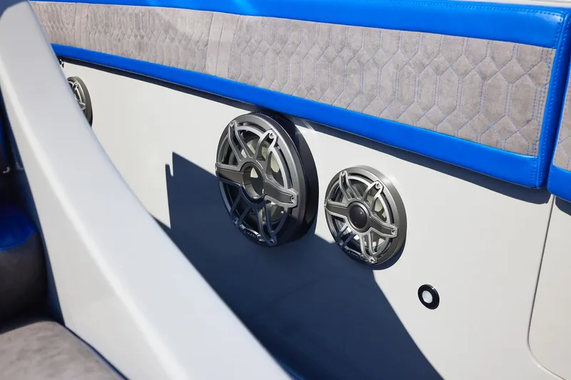 Slide: The Image of 2023 Midnight Express 43 Solstice boat interior with stylish speakers and blue accents. - 13