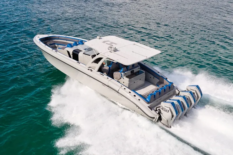 Slide: The Image of 2023 Midnight Express 43 Solstice boat cruising on open water, showcasing powerful engines. - 3