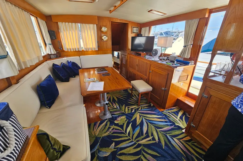 Slide: The Image of Interior of 1978 Grand Banks 42 Classic yacht with cozy seating and nautical decor. - 14