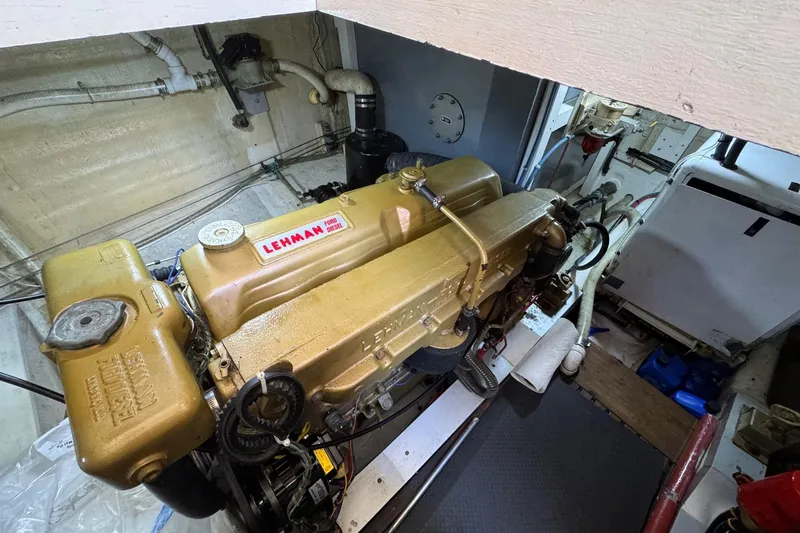 Slide: The Image of Engine room of a 1978 Grand Banks 42 Classic with Lehman Ford diesel engine. - 25