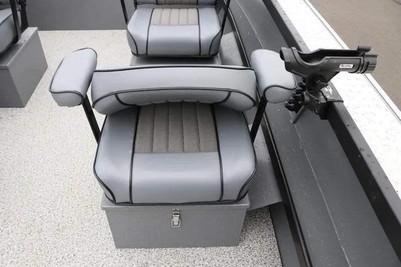 Slide: The Image of 2026 Alumaweld Columbia 23 boat seat with rod holder, featuring gray upholstery and storage compartment. - 10