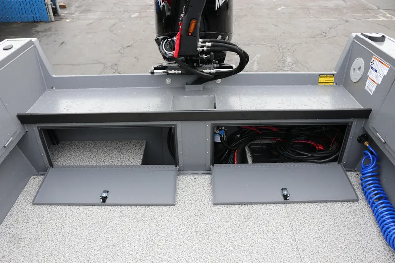 Slide: The Image of 2026 Alumaweld Columbia 23 boat storage compartments and engine area. - 23