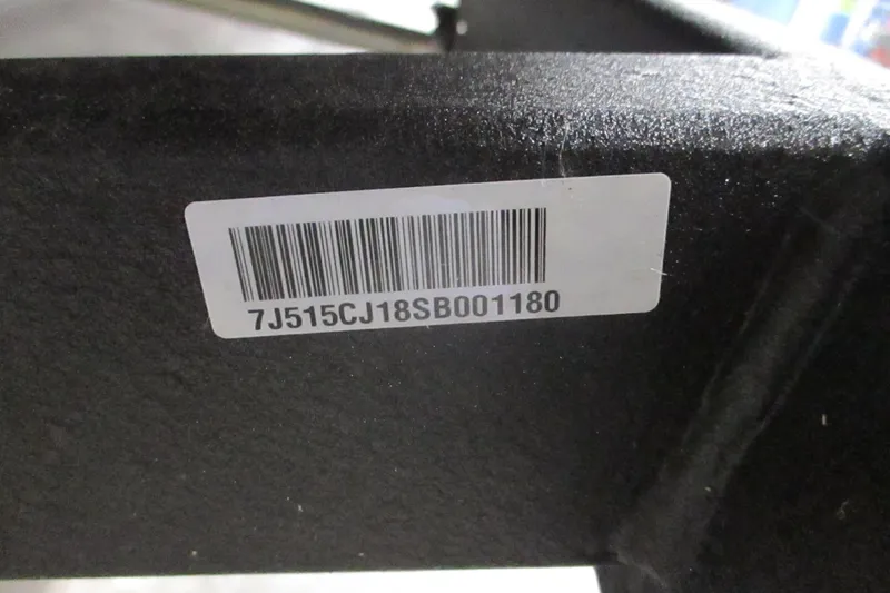 Slide: The Image of Barcode label on 2025 Tahoe T18 with serial number 7J515CJ18SB001180. - 9