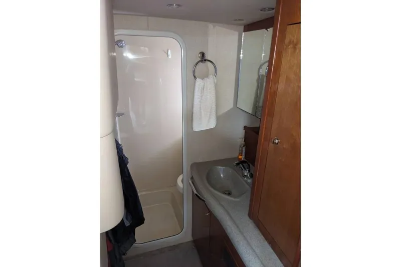 Slide: The Image of Bathroom interior of 2003 Cruisers 3970 yacht with shower and sink. - 11