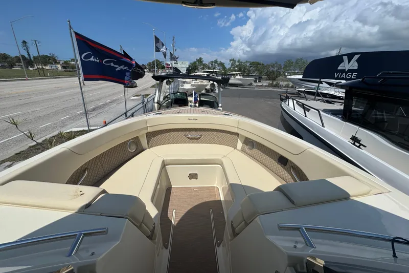 Slide: The Image of 2026 Chris-Craft Calypso 32 boat with spacious seating and elegant design. - 3