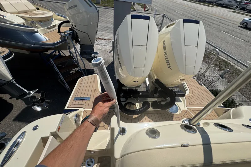 Slide: The Image of 2026 Chris-Craft Calypso 32 boat with dual Mercury outboard engines on deck. - 46