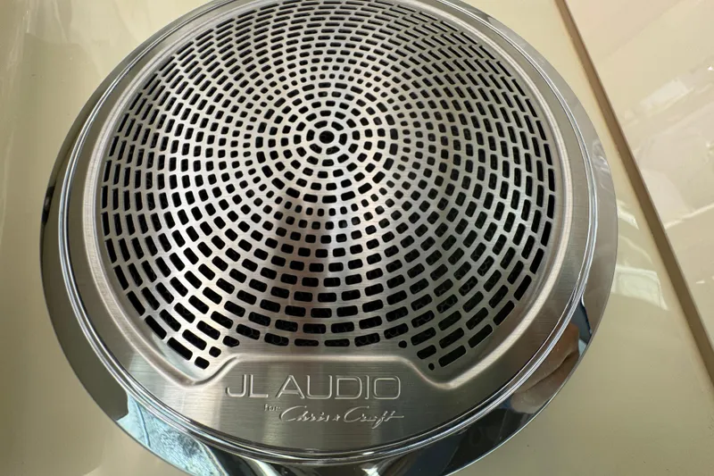 Slide: The Image of JL Audio speaker grille on 2026 Chris-Craft Calypso 32 boat. - 47