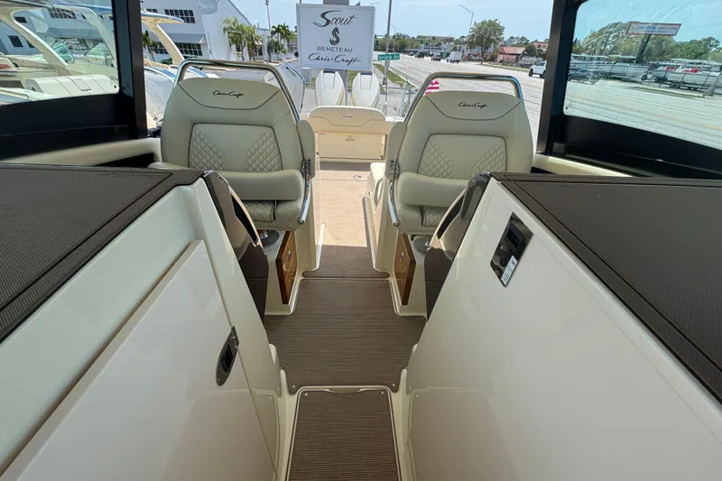 Slide: The Image of Interior view of 2026 Chris-Craft Calypso 32 boat with luxurious seating and modern design. - 7