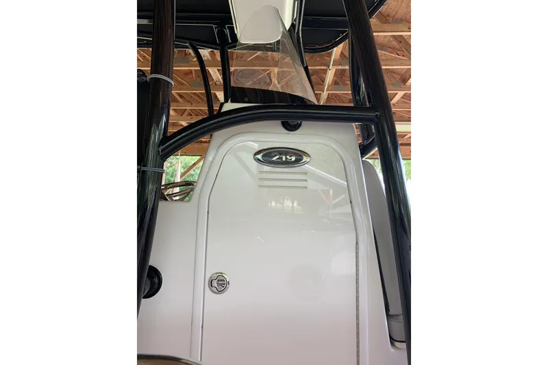 Slide: The Image of 2018 Sea Pro 219 Center Console boat interior with seating and equipment. - 4