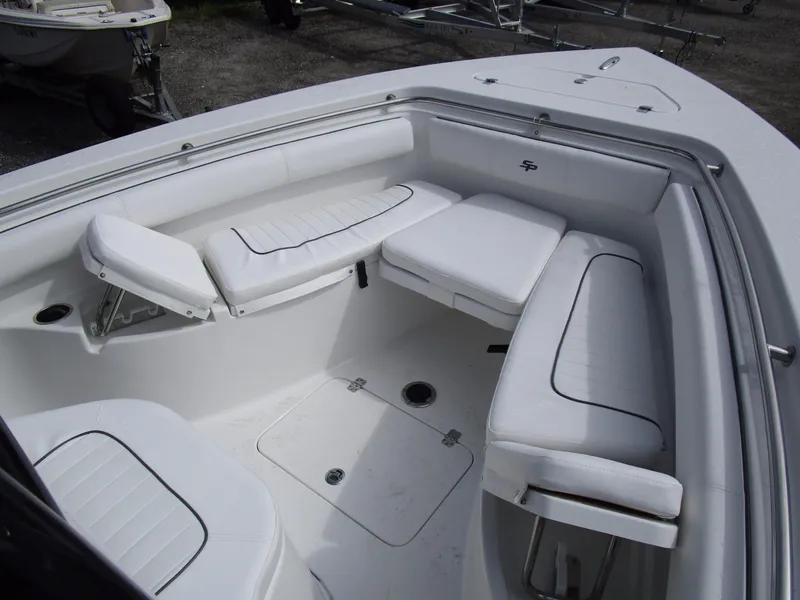 Slide: The Image of 2018 Sea Pro 219 Center Console boat under wooden roof structure. - 5