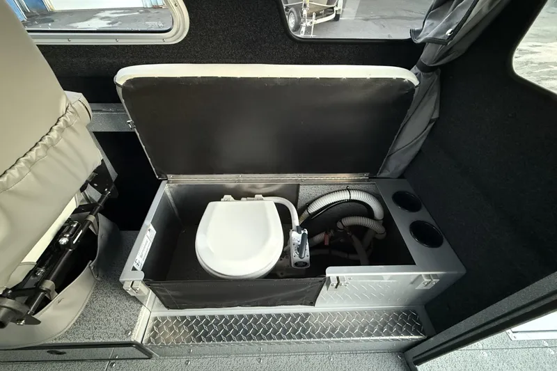 Slide: The Image of Interior of 2026 KingFisher 2625 Coastal Express with built-in marine toilet. - 21