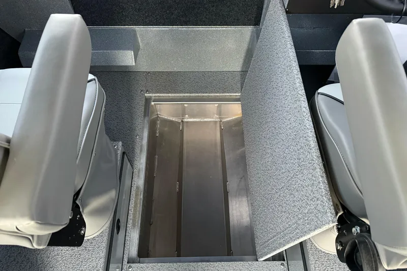 Slide: The Image of Interior view of 2026 KingFisher 2625 Coastal Express boat with open storage compartment. - 30