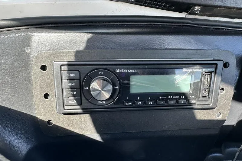 Slide: The Image of Clarion M508 stereo system in 2005 Master Craft Pro Star 205 boat dashboard. - 12