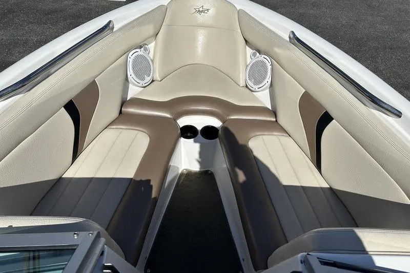 Slide: The Image of Interior of 2005 Master Craft Pro Star 205 boat with beige and brown seating. - 20
