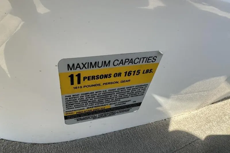 Slide: The Image of 2005 Master Craft Pro Star 205 capacity label: 11 persons or 1615 lbs. - 22