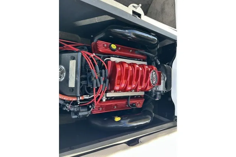 Slide: The Image of 2005 Master Craft Pro Star 205 engine with red and black components. - 8