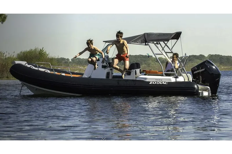 The Image of Manufacturer Provided Image: 2026 Zodiac Medline 6.8 boat with people enjoying water activities. - 0