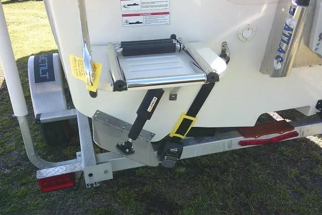 Slide: The Image of 2024 Carolina Skiff 21 LS boat trailer with ladder and safety features. - 12