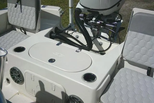 Slide: The Image of 2024 Carolina Skiff 21 LS boat interior with seating and motor details. - 29