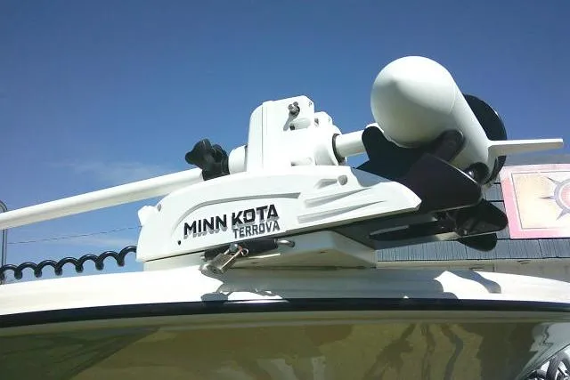 Slide: The Image of Minn Kota Terrova motor on 2024 Carolina Skiff 21 LS boat under clear sky. - 4