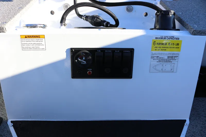 Slide: The Image of 2026 Smoker Craft Pro Lodge 160 control panel with fuel gauge and capacity warnings. - 14