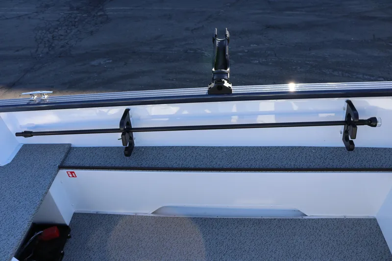 Slide: The Image of 2026 Smoker Craft Pro Lodge 160 boat interior with rod holder and seating. - 18
