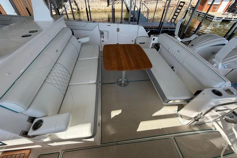 Slide: The Image of Open drawer on 2023 Regal 38 SAV boat, featuring a built-in Kenyon appliance. - 32