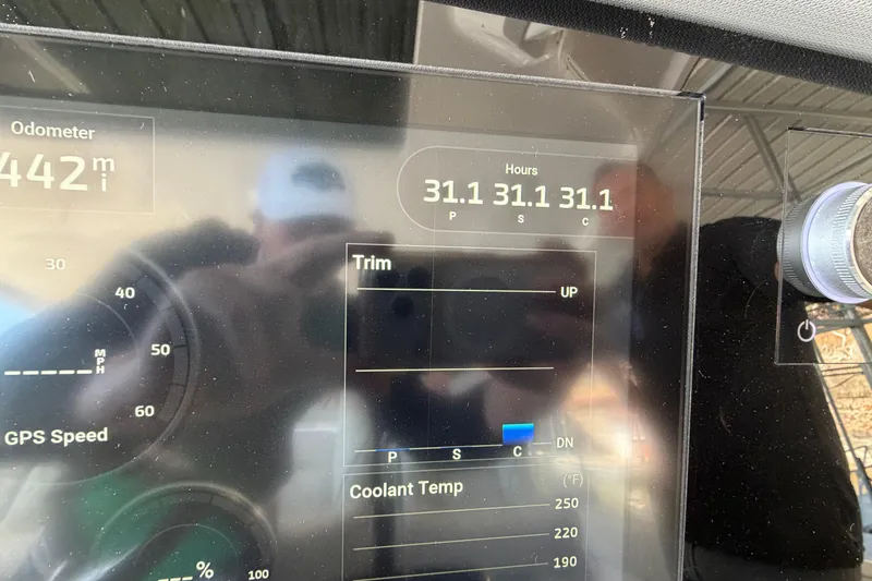 Slide: The Image of Dashboard of 2023 Regal 38 SAV boat showing digital gauges and controls. - 38