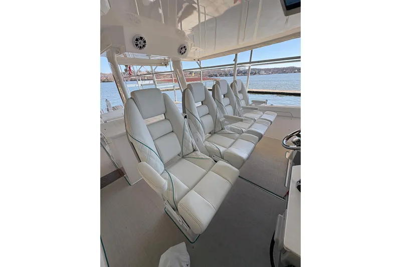 Slide: The Image of 2023 Regal 38 SAV boat interior with sleek design and modern amenities. - 45