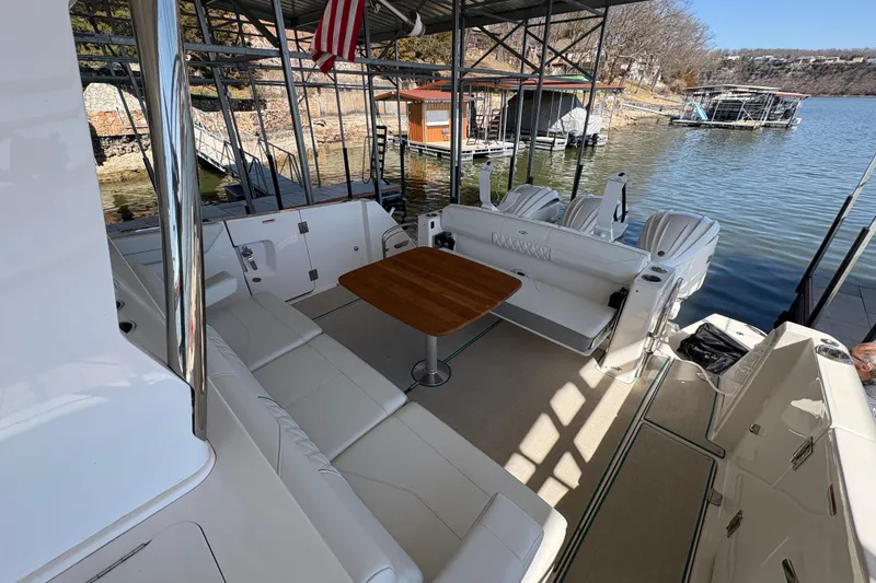 Slide: The Image of Control panel on 2023 Regal 38 SAV boat with labeled switches. - 48