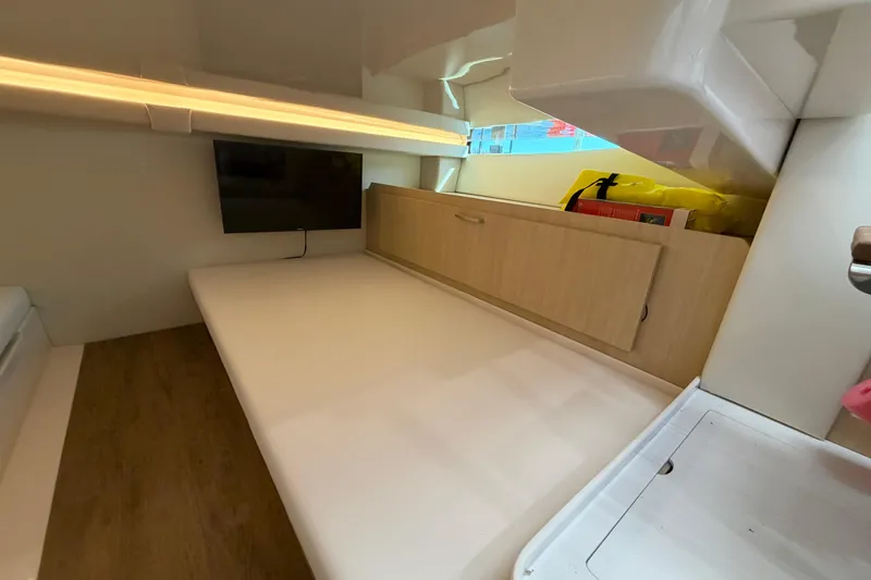 Slide: The Image of Luxurious interior of 2023 Regal 38 SAV yacht with white seating and modern design. - 65