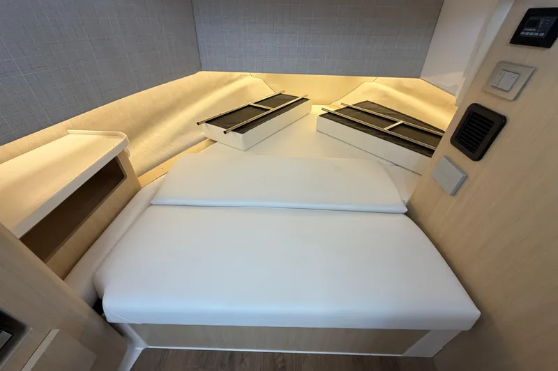 Slide: The Image of 2023 Regal 38 SAV cabin interior with modern design and comfortable bedding. - 68