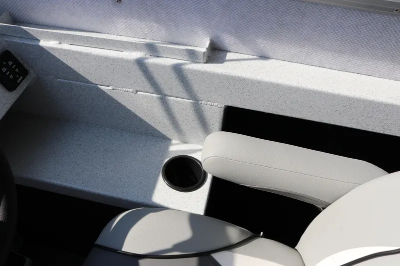 Slide: The Image of Interior of 2026 KingFisher 2425 Escape HT boat with cup holder and seat detail. - 23