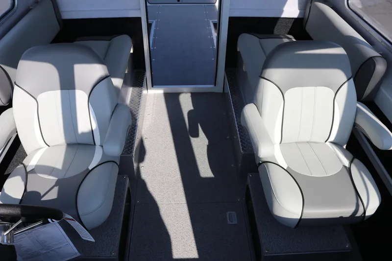 Slide: The Image of Interior of 2026 KingFisher 2425 Escape HT boat with two gray seats. - 27
