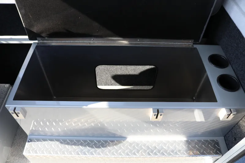 Slide: The Image of Storage compartment in 2026 KingFisher 2425 Escape HT boat with cup holders. - 41