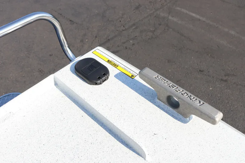 Slide: The Image of Close-up of 2026 KingFisher 2425 Escape HT boat cleat and caution label. - 42