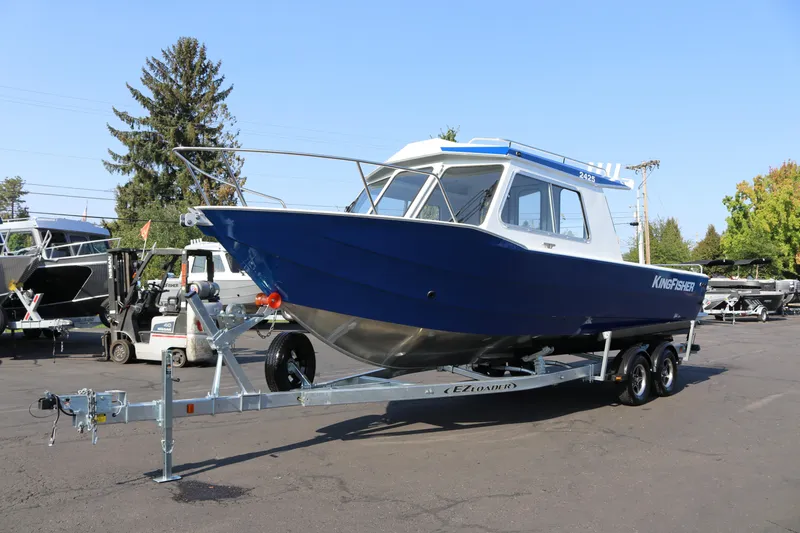 Slide: The Image of 2026 KingFisher 2425 Escape HT boat on trailer in outdoor setting. - 45