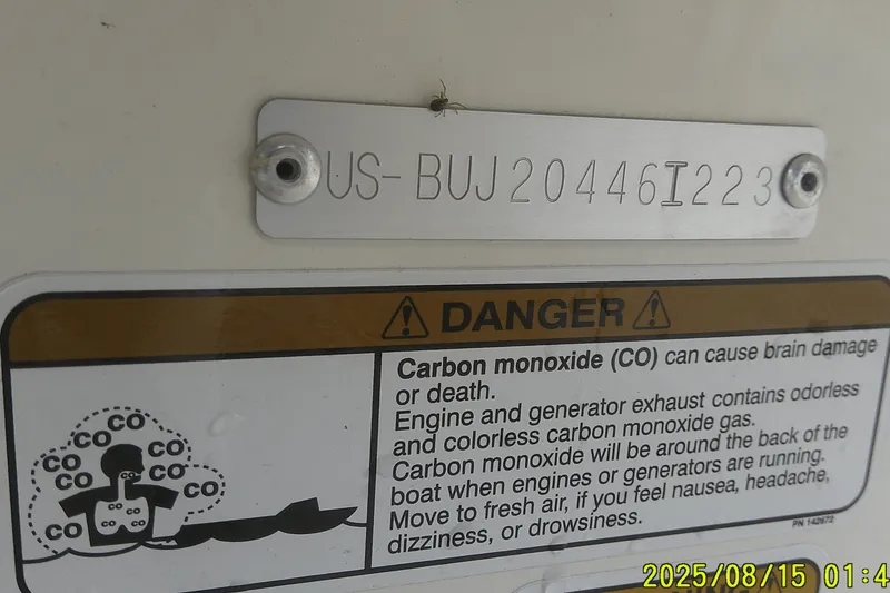 Slide: The Image of 2023 Mako Pro Skiff 19 CC warning label about carbon monoxide dangers. - 44
