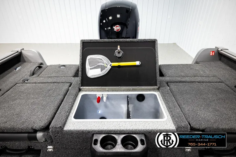 Slide: The Image of 2026 Lund 1875 Impact XS boat interior with livewell and fishing net. - 21