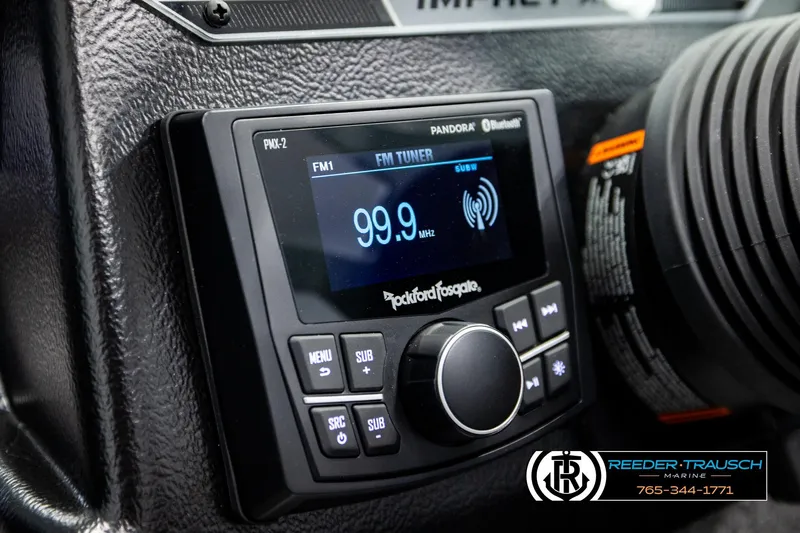 Slide: The Image of Rockford Fosgate PMX-2 stereo in 2026 Lund 1875 Impact XS boat dashboard. - 35
