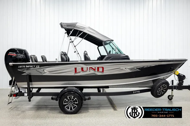 Slide: The Image of 2026 Lund 1875 Impact XS boat with Mercury Pro XS engine on trailer. - 4