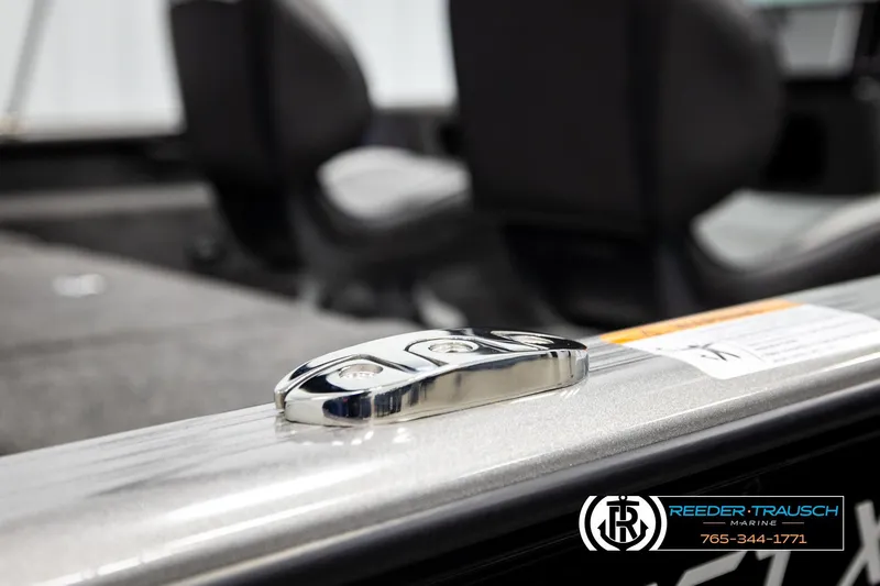 Slide: The Image of 2026 Lund 1875 Impact XS boat interior with cleat and seating detail. - 57