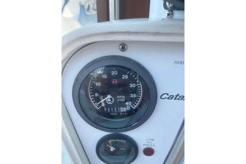 Slide: The Image of Tachometer and oil pressure gauge on a 1995 Catalina 36 MkII sailboat. - 10