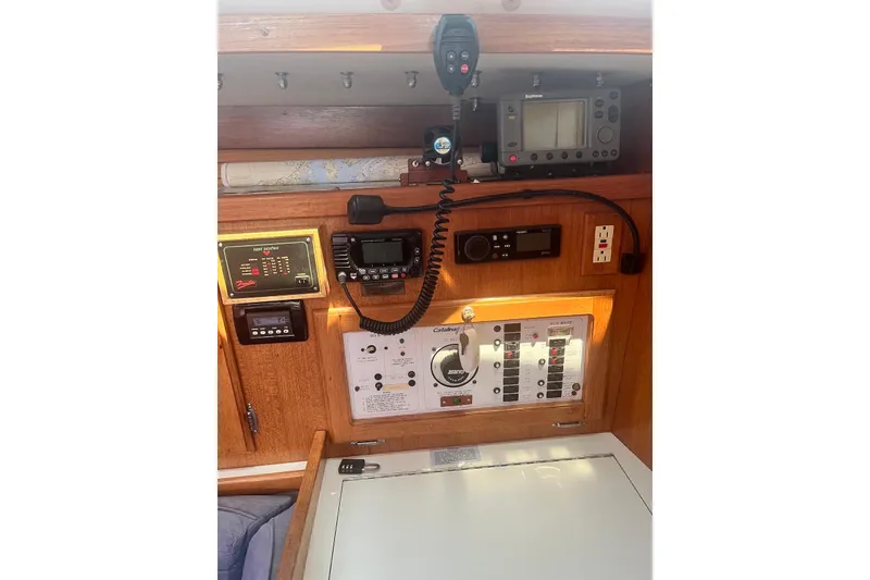 Slide: The Image of Control panel of a 1995 Catalina 36 MkII sailboat with navigation equipment. - 15