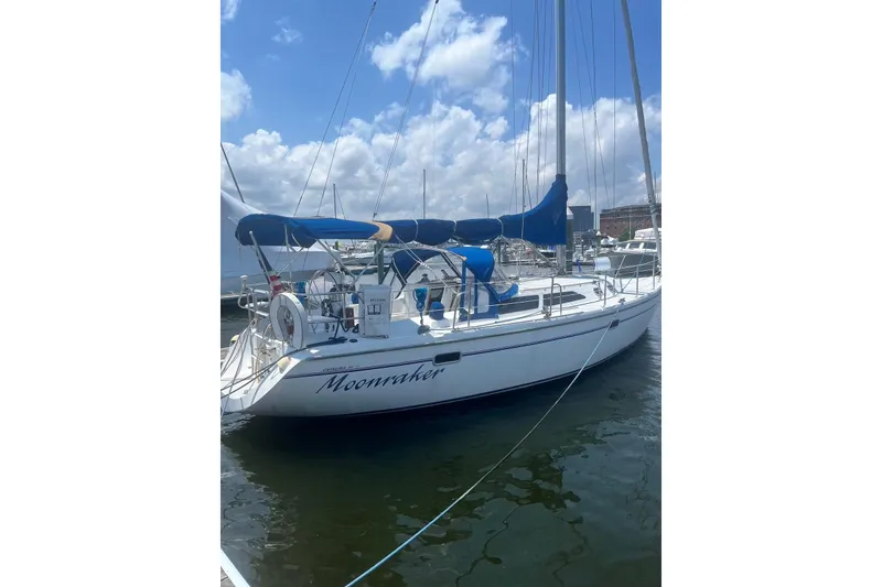 Slide: The Image of Sailboat "Moonraker" docked, Catalina 36 MkII, 1995 model, with blue covers. - 2