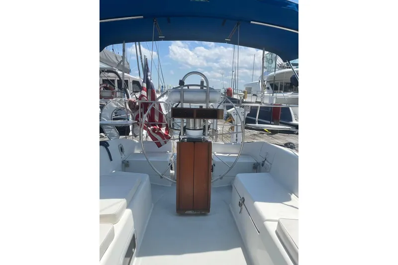 Slide: The Image of Cockpit of 1995 Catalina 36 MkII sailboat with steering wheel and seating. - 7