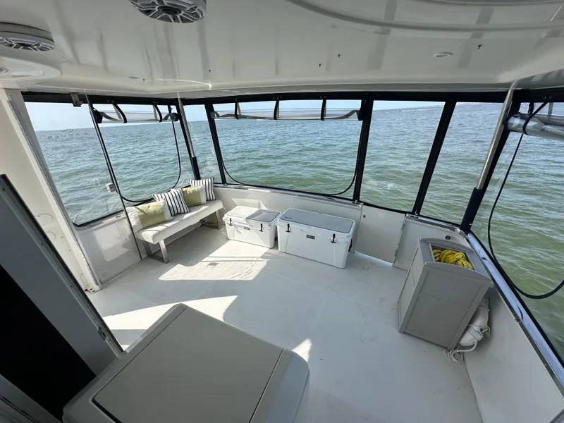 Slide: The Image of Interior view of 2000 Carver 406 Motor Yacht with ocean backdrop. - 11